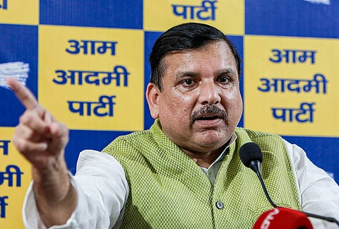 AAP leader Sanjay Singh addresses a press conference, in New Delhi. Singh on Friday slammed the party's Rajya Sabha members' defection as a work of the BJP under 'Operation Lotus', and said that the people of Punjab will not forgive the seven who quit.