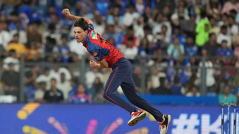 Punjab Kings' Marco Jansen bowls a delivery during the Indian Premier League cricket match between Mumbai Indians and Punjab Kings in Mumbai. - | Photo: AP/Rafiq Maqbool