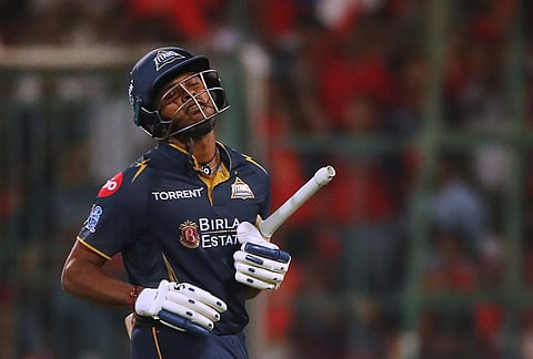 Gujarat Titans’ Sai Sudharsan leaves the ground after losing his wicket during the Indian Premier League cricket match between Royal Challengers Bengaluru and Gujarat Titans in Bengaluru.