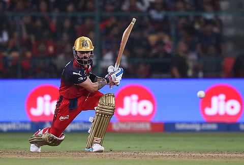 Royal Challengers Bengaluru's Virat Kohli plays a shot during the Indian Premier League cricket match between Royal Challengers Bengaluru and Gujarat Titans in Bengaluru.