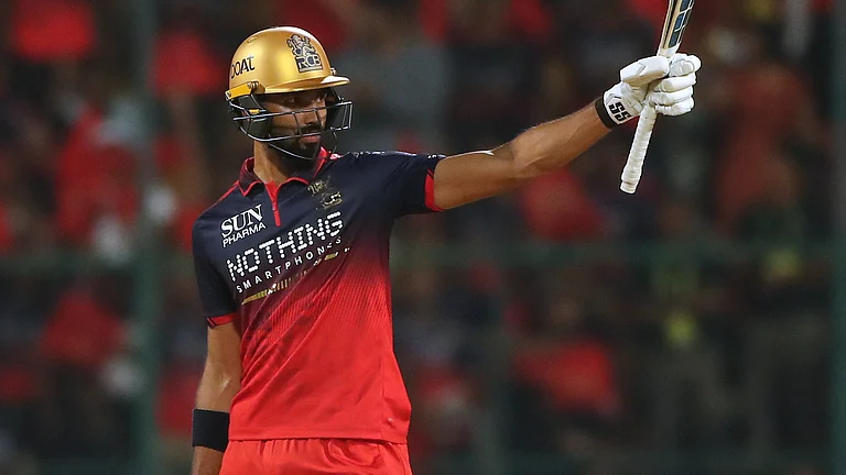 Devdutt Padikkal celebrates his half-century against Gujarat Titans in IPL 2026 clash at the M Chinnaswamy Stadium in Bengaluru. - AP Photo