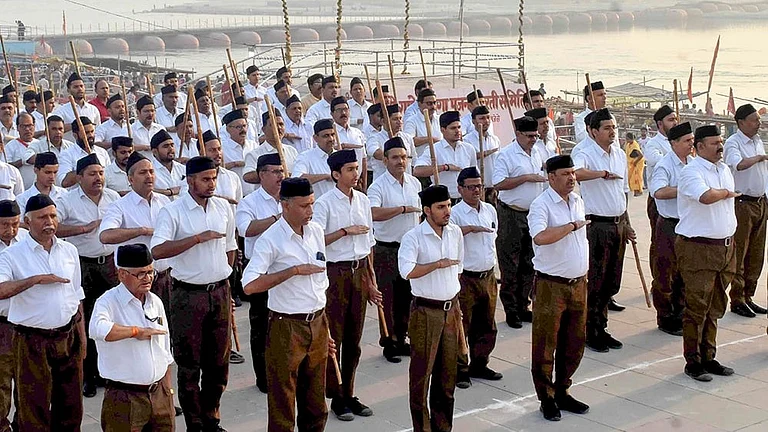 Rashtriya Swayamsevak Sangh (RSS) workers take part in a programme on the first day of the Hindu New Year, in Prayagraj. - | Photo: PTI | Representative Image