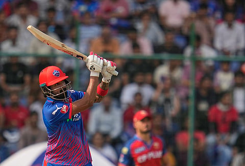 Delhi Capitals' KL Rahul hits a six during the Indian Premier League cricket match between Delhi Capitals and Punjab Kings in New Delhi.