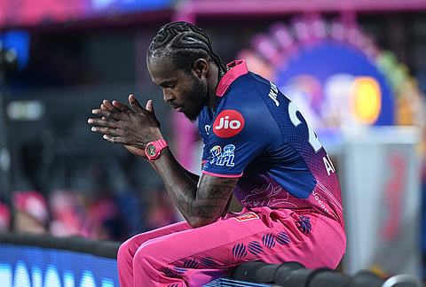 Rajasthan Royals' Jofra Archer rests during the Indian Premier League cricket match between Rajasthan Royals and Sunrisers Hyderabad in Jaipur.