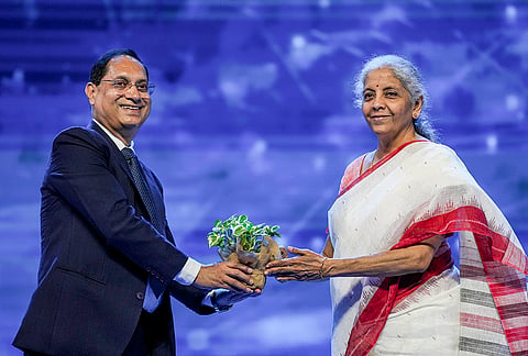Union Finance Minister Nirmala Sitharaman being presented a sapling as a memento by Securities and Exchange Board of India (SEBI) Chairman Tuhin Kanta Pandey during the 38th SEBI Foundation Day, at the Jio World Convention Centre, in Mumbai, Maharashtra.