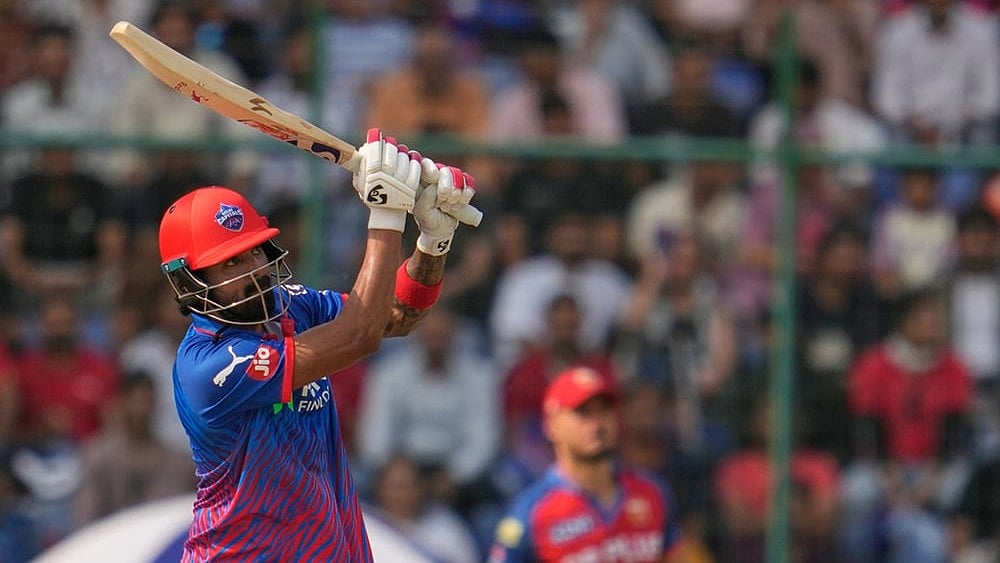 Delhi Capitals' KL Rahul hits a six during the Indian Premier League cricket match between Delhi Capitals and Punjab Kings in New Delhi. - | Photo: AP/Manish Swarup