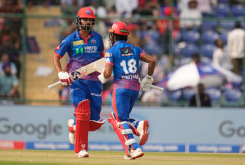 Delhi Capitals' KL Rahul, left, and Pathum Nissanka run between the wickets to score during the Indian Premier League cricket match between Delhi Capitals and Punjab Kings in New Delhi.