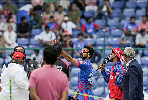 Punjab Kings' captain Shreyas Iyer and Delhi Capitals' captain Axar Patel during the toss before an Indian Premier League (IPL) 2026 T20 cricket match between Punjab Kings and Delhi Capitals, in New Delhi.