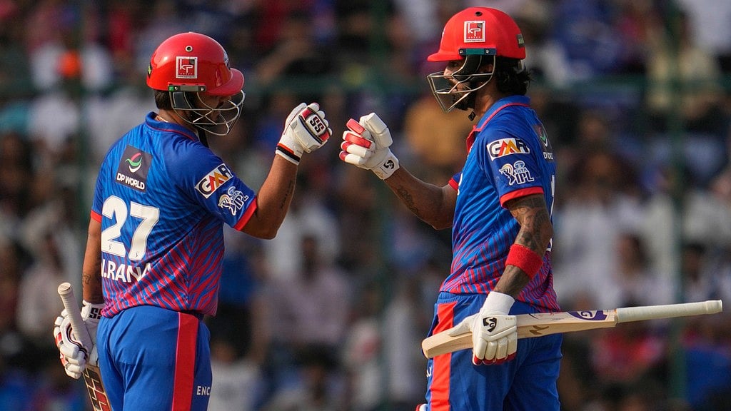AP/Manish Swarup : KL Rahul, left, and batting partner Nitish Rana in action during the Indian Premier League match between Delhi Capitals and Punjab Kings in New Delhi.