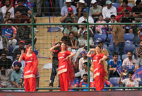 Cheer girls dance during the Indian Premier League cricket match between Delhi Capitals and Punjab Kings in New Delhi.