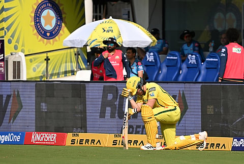 Chennai Super Kings' Dewald Brevis stretches as he steps on to the field to bat during the Indian Premier League cricket match between Chennai Super Kings and Gujarat Titans in Chennai.