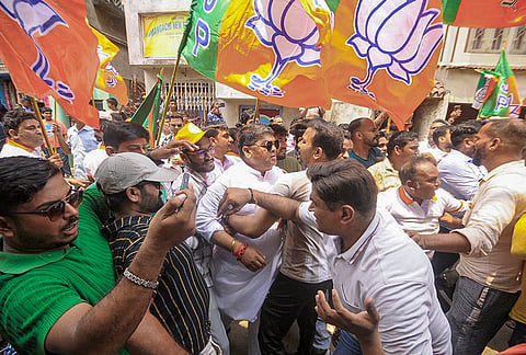 TMC and BJP supporters, after a clash broke out over the chanting of slogans during a roadshow of the saffron party's Uttar Howrah candidate, Umesh Rai, in Howrah.