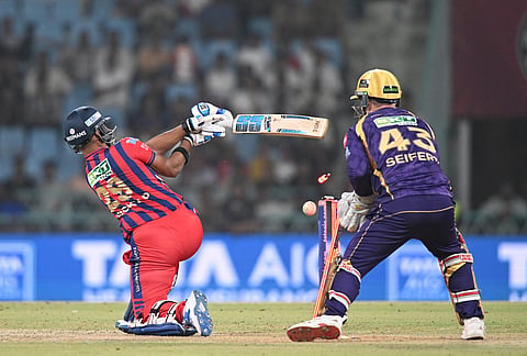 Lucknow Super Giants' Nicholas Pooran is bowled out by Kolkata Knight Riders' Sunil Narine during the super over of the Indian Premier League cricket match between Kolkata Knight Riders and Lucknow Super Giants in Lucknow.