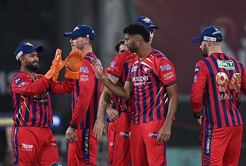 Lucknow Super Giants' Mohsin Khan, second from right, celebrates with teammates the wicket of Kolkata Knight Riders' Tim Seifert during the Indian Premier League cricket match between Kolkata Knight Riders and Lucknow Super Giants in Lucknow.
