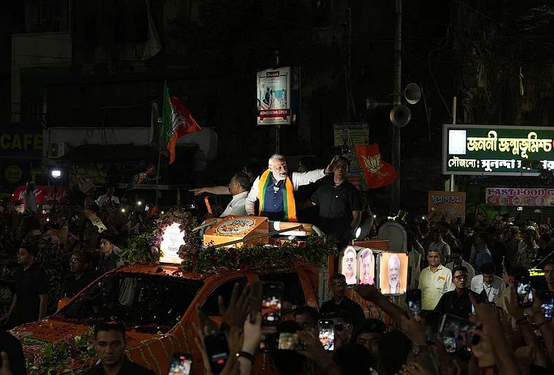PM Modi flower-adorned vehicle roadshow