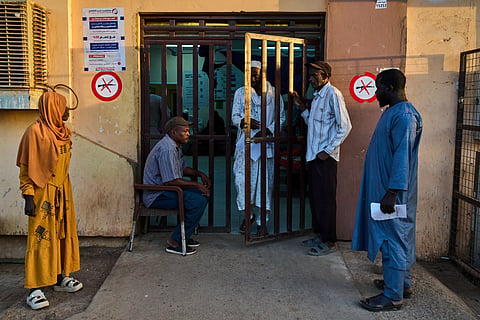 Patients wait at Al Nao Hospital in Omdurman, on the outskirts of Khartoum
