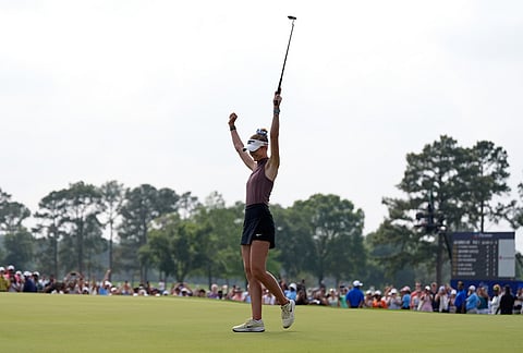 Nelly Korda celebrates after winning the Chevron Championship LPGA golf tournament in Houston. 