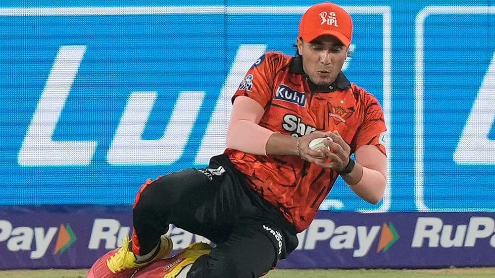 Sunrisers Hyderabad's Abhishek Sharma takes the catch to dismiss Delhi Capitals' Nitish Rana during the Indian Premier League cricket match between Sunrisers Hyderabad and Delhi Capitals in Hyderabad. - | Photo: AP/Mahesh Kumar A.