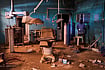A Surgeon's Resolve: How Dr. Jamal Eltaeb Saved Lives In Sudan AP : A guard walks through a war-damaged section of Al Shaabi Hospital in Khartoum