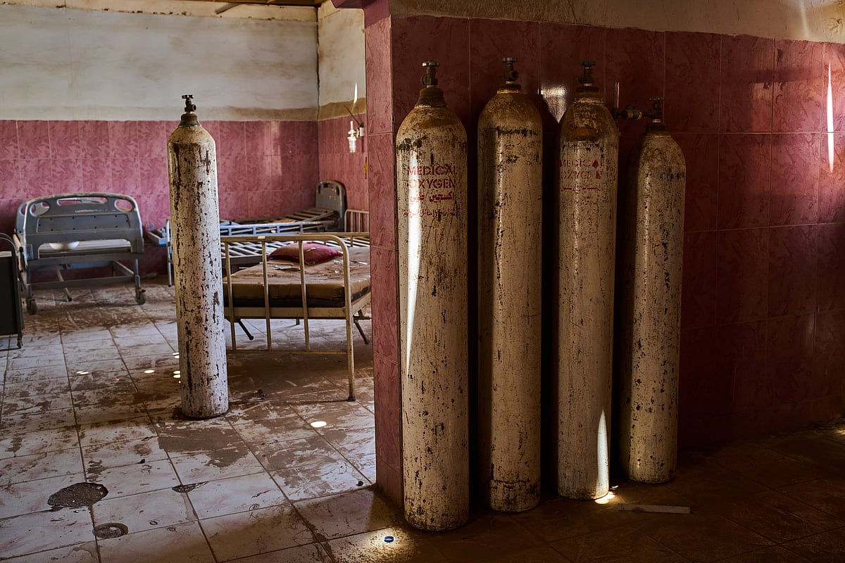 Oxygen canisters and hospital beds