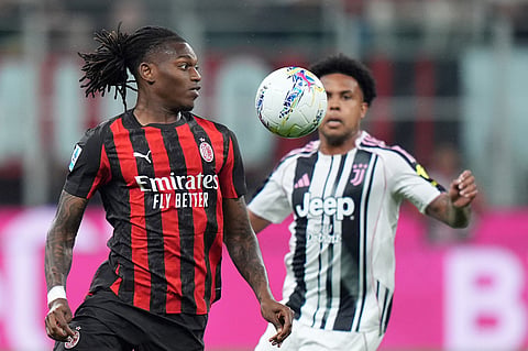 AC Milan's Rafael Leao controls the ball during a Serie A soccer match between AC Milan and Juventus, in Milan, Italy.