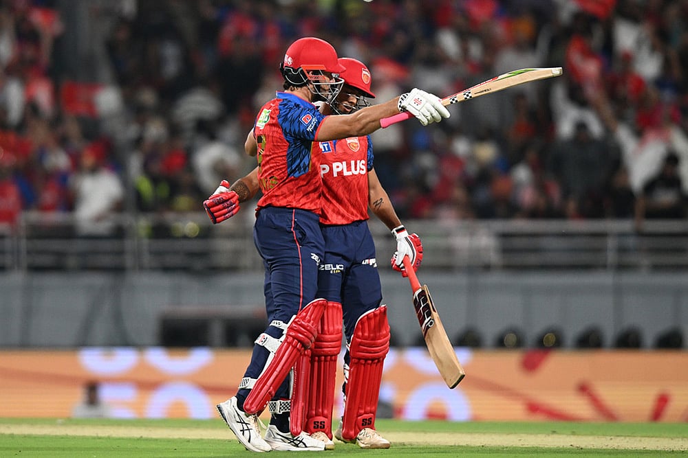 Punjab Kings Marcus Stoinis  celebrates his fifty runs