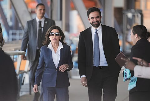 New York Gov. Kathy Hochul and New York City Mayor Zohran Mamdani arrive to a news conference in the Staten Island borough of New York.