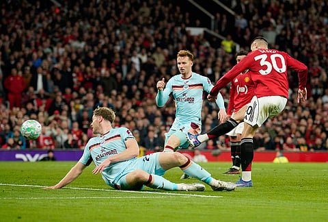 Manchester United's Benjamin Sesko scores during the Premier League soccer match between Manchester United and Brentford in Manchester, England.
