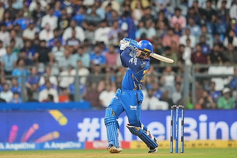 Mumbai Indians' Ryan Rickelton plays a shot during the Indian Premier League cricket match between Mumbai Indians and Sunrisers Hyderabad in Mumbai, India,