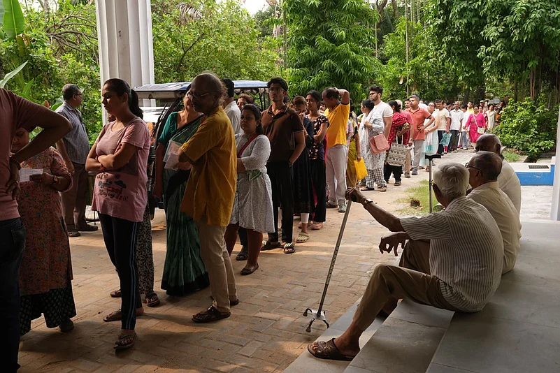 assembly elections People wait in queues