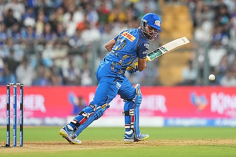 Mumbai Indians' Naman Dhir plays a shot during the Indian Premier League cricket match between Mumbai Indians and Sunrisers Hyderabad in Mumbai, India.