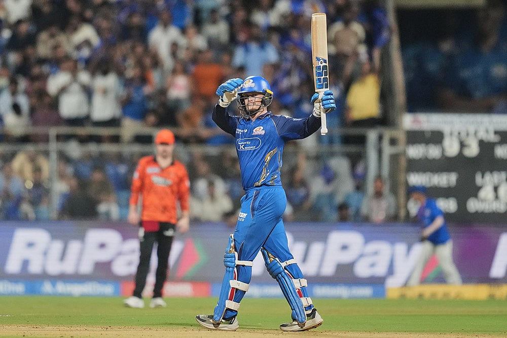 Mumbai Indians Ryan Rickelton celebrates his fifty runs