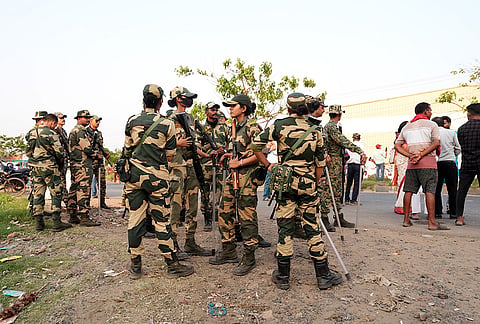Armed security personnel keep vigil amid the West Bengal Assembly elections, in Kolkata.
