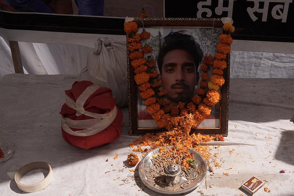 Pandav Kumar, a delivery agent and the sole breadwinner of a family of four, was shot dead by a Delhi Police personnel in Jafarpur Kalan on Sunday night. The officer allegedly shot the 22-year-old at point-blank range; the bullet passed through him and struck Krishn, who was riding pillion. - | Photo: Tribhuvan Tiwari