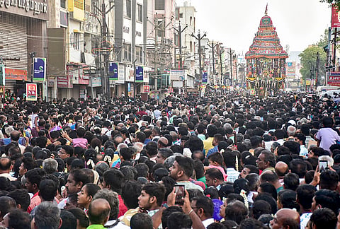 People take part in Sri Meenakshi Sundareswarar Temple Car Festival (Ther Thiruvizha) during the Chithirai festival, in Madurai district, Tamil Nadu.