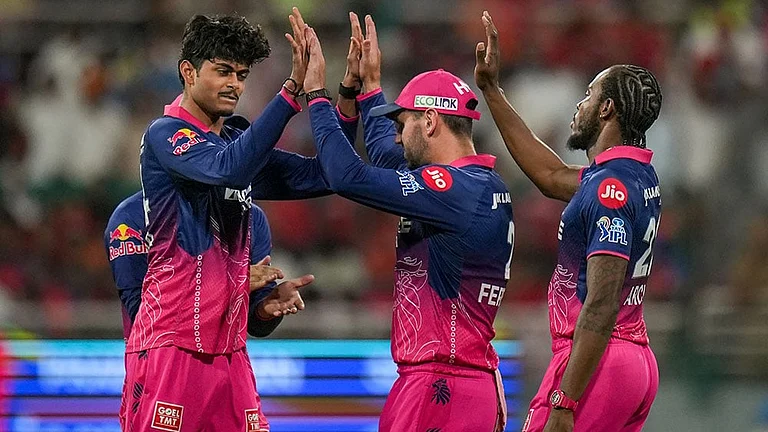 Rajasthan Royals' Yashraj Punja, left, celebrates with teammates after taking the wicket of Punjab Kings' Cooper Connolly during the Indian Premier League (IPL) 2026 T20 cricket match between Punjab Kings and Rajasthan Royals, in Mullanpur. - | Photo: PTI/Shiva Sharma
