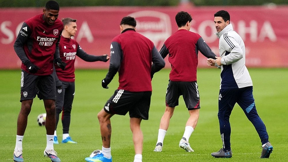 | Photo: John Walton/PA via AP : Arsenal manager Mikel Arteta during a training session in London.