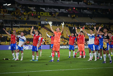 Chile's Universidad Catolica players celebrate at the end of Copa Libertadores Group D soccer match against Ecuador's Barcelona in Guayaquil, Ecuador.