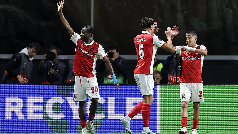 Braga's Mario Dorgeles, left, celebrates after scoring his side's second goal during the Europa League semifinal, first leg, soccer match between SC Braga and Freiburg in Braga, Portugal, Thursday, April 30, 2026. - | Photo: AP/Miguel Angelo Pereira