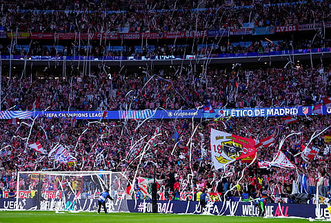 Toliet paper streamers are unfurled from the stands before a Champions League semifinal, first leg, soccer match between Atletico Madrid and Arsenal in Madrid, Spain.
