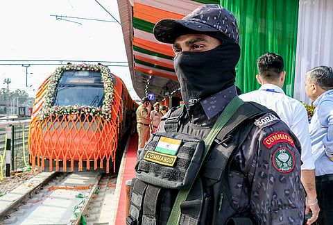 Railway Protection Force (RPF) personnel stand guard as preparations are underway ahead of the flagging-off ceremony of the extended Srinagar-Katra Vande Bharat Express by Union Railways Minister Ashwini Vaishnaw from Jammu Tawi Railway Station (JAT), in Jammu district, Jammu and Kashmir.