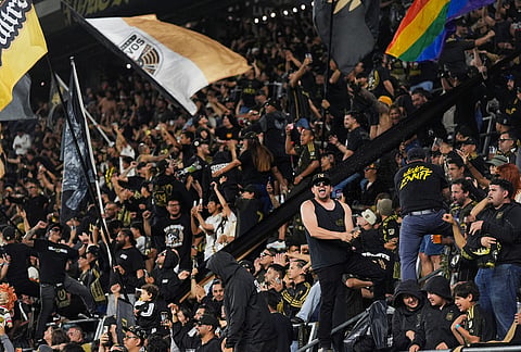 Fans celebrate a goal by LAFC midfielder Timothy Tillman during the second half of the first leg of a CONCACAF Champions Cup semifinal soccer match against Toluca in Los Angeles.