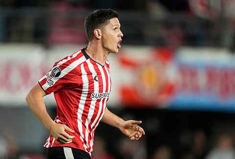 Guido Carrillo of Argentina's Estudiantes de La Plata celebrates scoring his side's opening goal against Brazil's Flamengo during a Copa Libertadores Group A soccer match in La Plata, Argentina.