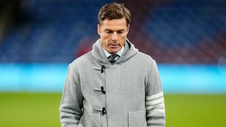 Burnley manager Scott Parker reacts after the Premier League soccer match against Manchester City, Wednesday, April 22 2026, in Burnley, England. - | Photo: PA/Nick Potts via AP