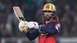 AP Photo/Ajit Solanki : Royal Challengers Bengaluru's captain Rajat Patidar plays a shot during the Indian Premier League cricket match between Gujarat Titans and Royal Challengers Bengaluru in Ahmedabad, India, Thursday, April 30, 2026. (AP Photo/Ajit Solanki)