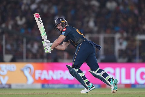 Gujarat Titans' Jos Buttler plays a shot during the Indian Premier League cricket match between Gujarat Titans and Royal Challengers Bengaluru in Ahmedabad, India.