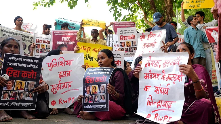 Supporters take part in a protest against the arrest and detention of workers during the Noida factory protests, at Jantar Mantar in New Delhi. on April 30, 2026 - Credit: Suresh Kumar Pandey