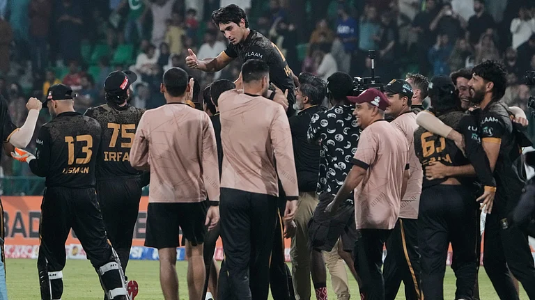 Hyderabad Kingsmen Hunain Shah, top center, celebrates with teammates after their team won the Pakistan Super League second eliminator cricket match against Islamabad United, in Lahore, Pakistan, Friday, May 1, 2026 - (AP Photo/K.M. Chaudary)