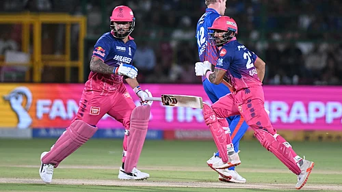 (AP Photo) : Rajasthan Royals Dhruv Jurel with batting partner captain Riyan Parag run between the wickets to score during the Indian Premier League cricket match between Delhi Capitals and Rajasthan Royals in Jaipur, India, Friday, May 1, 2026