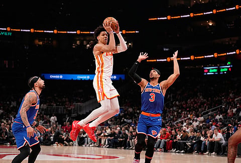 Atlanta Hawks forward Jalen Johnson (1) shoots the ball in the first half during Game 6 in a first-round NBA basketball playoffs series against the New York Knicks in Atlanta. 
